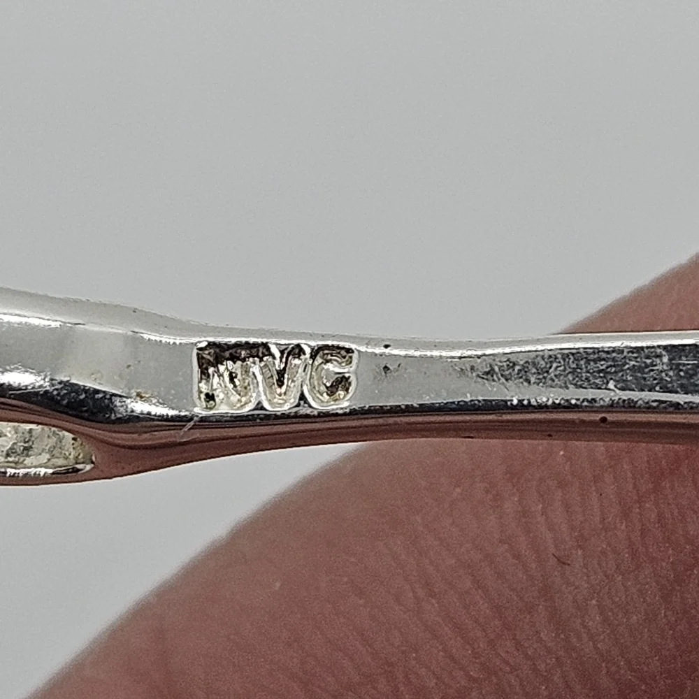 silver tone long skinny teardrop pendant with rhinestones